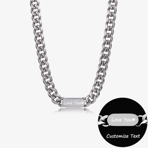 Silver-tone curb chain necklace with an oval plate engraved Love You, with an engraving close-up