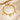 Gold paperclip chain bracelet with letter W charm, round coin charms and bead charms
