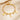 Gold paperclip chain bracelet with letter I charm, round coin charms and bead charms