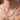 Man with tattoos wearing the silver-tone tennis necklace