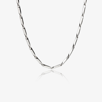 Silver-tone rhombus link chain necklace on white background