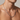 Man wearing silver-tone rhombus link chain necklace, close-up of neck and collarbone