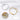 Silver-tone and gold-tone curved bar bracelets laid flat with an engraving close-up