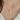 Close-up of a gold-tone heart pendant necklace without engraving worn over a white knit