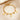 Gold paperclip chain bracelet with letter C charm, round coin charms and bead charms