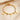 Gold paperclip chain bracelet with letter V charm, round coin charms and bead charms