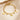 Gold paperclip chain bracelet with letter M charm, round coin charms and bead charms