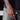 Silver chain bracelet worn on a man's wrist with rings