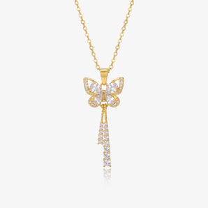 Gold-tone butterfly pendant necklace with a two-strand tassel of clear stones, product view